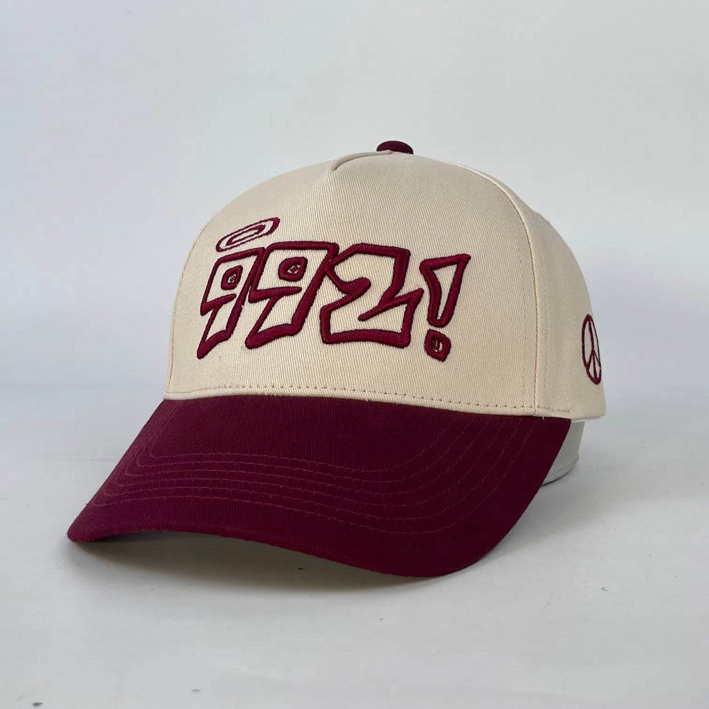 baseball cap in burgundy and cream